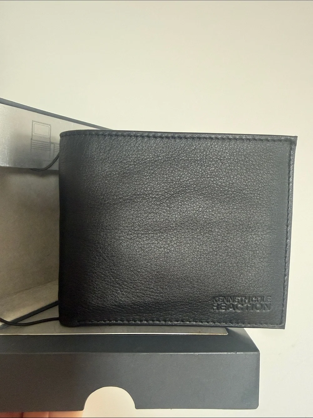 Kenneth Cole Reaction Black Leather Bifold Wallet with Embossed Logo
